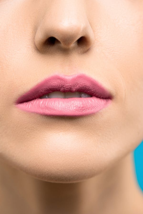 Close-up of full, natural-looking lips after enhancement